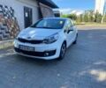 Білий Кіа Ріо, об'ємом двигуна 1.4 л та пробігом 88 тис. км за 8300 $, фото 1 на Automoto.ua