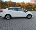 Білий Кіа Ріо, об'ємом двигуна 1.4 л та пробігом 49 тис. км за 10600 $, фото 9 на Automoto.ua