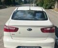 Білий Кіа Ріо, об'ємом двигуна 1.4 л та пробігом 49 тис. км за 10300 $, фото 2 на Automoto.ua
