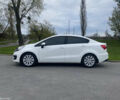 Білий Кіа Ріо, об'ємом двигуна 1.4 л та пробігом 192 тис. км за 9600 $, фото 1 на Automoto.ua