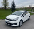 Білий Кіа Ріо, об'ємом двигуна 1.4 л та пробігом 192 тис. км за 9600 $, фото 1 на Automoto.ua