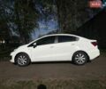 Білий Кіа Ріо, об'ємом двигуна 1.4 л та пробігом 140 тис. км за 9350 $, фото 2 на Automoto.ua