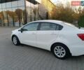 Білий Кіа Ріо, об'ємом двигуна 1.4 л та пробігом 49 тис. км за 10600 $, фото 16 на Automoto.ua