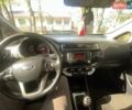 Білий Кіа Ріо, об'ємом двигуна 1.4 л та пробігом 140 тис. км за 9350 $, фото 13 на Automoto.ua