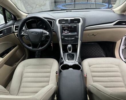 Білий Кіа Ріо, об'ємом двигуна 1.6 л та пробігом 144 тис. км за 12999 $, фото 9 на Automoto.ua
