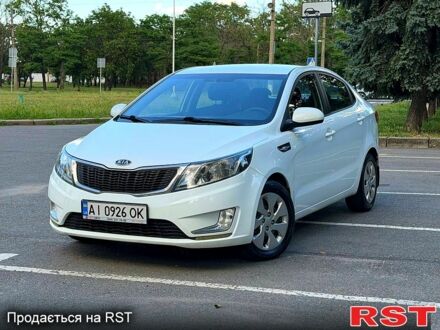 Білий Кіа Ріо, об'ємом двигуна 1.4 л та пробігом 157 тис. км за 6300 $, фото 1 на Automoto.ua
