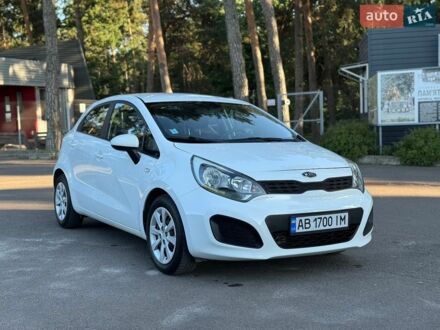 Білий Кіа Ріо, об'ємом двигуна 1.25 л та пробігом 128 тис. км за 6500 $, фото 1 на Automoto.ua