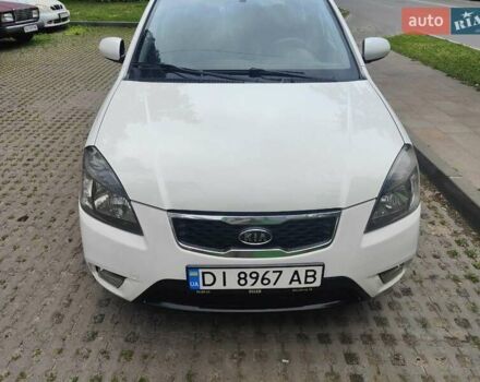 Білий Кіа Ріо, об'ємом двигуна 1.4 л та пробігом 248 тис. км за 5900 $, фото 1 на Automoto.ua