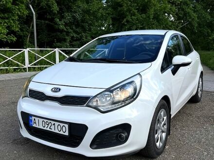 Білий Кіа Ріо, об'ємом двигуна 1.1 л та пробігом 212 тис. км за 5800 $, фото 1 на Automoto.ua