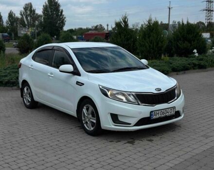Білий Кіа Ріо, об'ємом двигуна 1.4 л та пробігом 217 тис. км за 5955 $, фото 1 на Automoto.ua