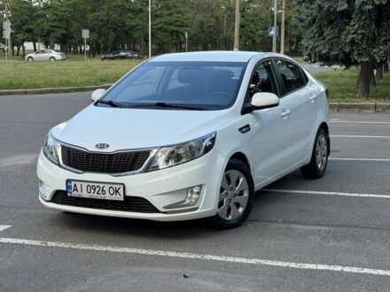 Білий Кіа Ріо, об'ємом двигуна 1.4 л та пробігом 157 тис. км за 6400 $, фото 1 на Automoto.ua