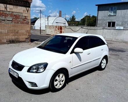 Білий Кіа Ріо, об'ємом двигуна 1.4 л та пробігом 141 тис. км за 6200 $, фото 1 на Automoto.ua