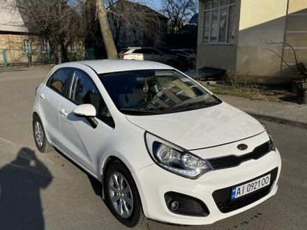 Білий Кіа Ріо, об'ємом двигуна 1.12 л та пробігом 203 тис. км за 6300 $, фото 1 на Automoto.ua