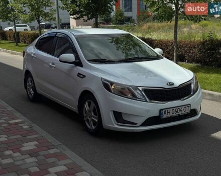 Белый Киа Рио, объемом двигателя 1.4 л и пробегом 219 тыс. км за 6400 $, фото 1 на Automoto.ua