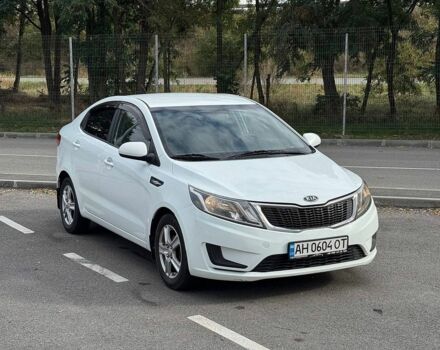 Белый Киа Рио, объемом двигателя 1.4 л и пробегом 218 тыс. км за 5750 $, фото 1 на Automoto.ua