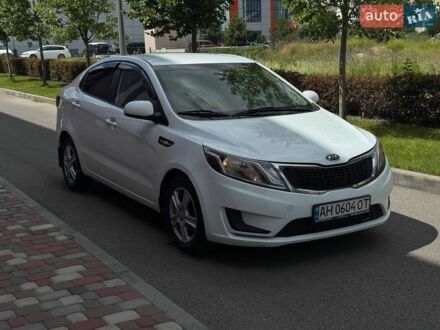 Білий Кіа Ріо, об'ємом двигуна 1.4 л та пробігом 219 тис. км за 5999 $, фото 1 на Automoto.ua
