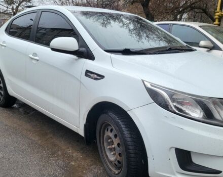 Белый Киа Рио, объемом двигателя 1.4 л и пробегом 220 тыс. км за 6100 $, фото 1 на Automoto.ua