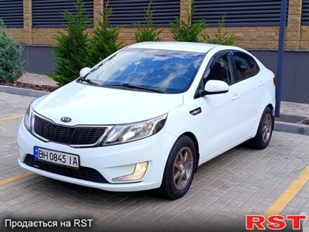 Білий Кіа Ріо, об'ємом двигуна 1.4 л та пробігом 99 тис. км за 6500 $, фото 1 на Automoto.ua