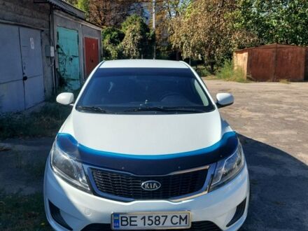 Білий Кіа Ріо, об'ємом двигуна 1.4 л та пробігом 69 тис. км за 8999 $, фото 1 на Automoto.ua