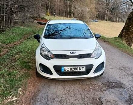 Белый Киа Рио, объемом двигателя 1.12 л и пробегом 210 тыс. км за 6300 $, фото 1 на Automoto.ua
