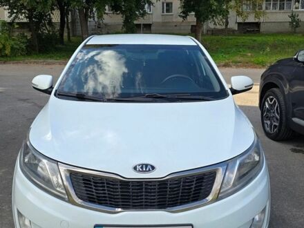 Белый Киа Рио, объемом двигателя 1.6 л и пробегом 299 тыс. км за 5800 $, фото 1 на Automoto.ua
