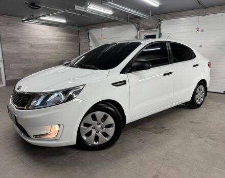 Білий Кіа Ріо, об'ємом двигуна 1.4 л та пробігом 167 тис. км за 7500 $, фото 1 на Automoto.ua