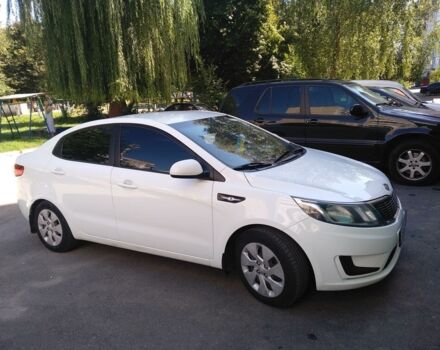 Білий Кіа Ріо, об'ємом двигуна 1.4 л та пробігом 148 тис. км за 8700 $, фото 1 на Automoto.ua