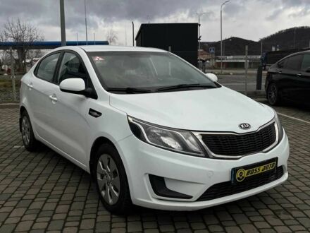 Білий Кіа Ріо, об'ємом двигуна 1.4 л та пробігом 200 тис. км за 6900 $, фото 1 на Automoto.ua