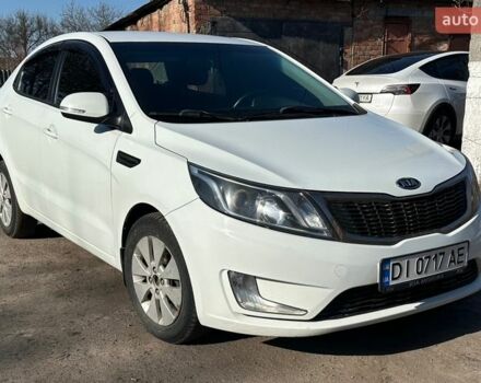 Белый Киа Рио, объемом двигателя 1.59 л и пробегом 221 тыс. км за 6000 $, фото 1 на Automoto.ua