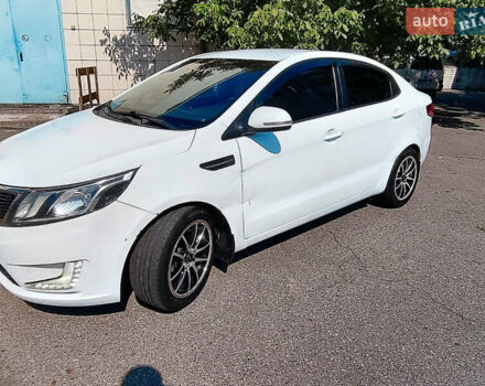 Білий Кіа Ріо, об'ємом двигуна 1.6 л та пробігом 206 тис. км за 6600 $, фото 1 на Automoto.ua