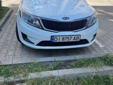 Білий Кіа Ріо, об'ємом двигуна 1.4 л та пробігом 171 тис. км за 6800 $, фото 1 на Automoto.ua