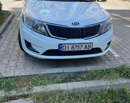 Білий Кіа Ріо, об'ємом двигуна 1.4 л та пробігом 171 тис. км за 6800 $, фото 1 на Automoto.ua