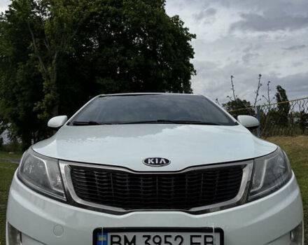 Білий Кіа Ріо, об'ємом двигуна 1.4 л та пробігом 195 тис. км за 6500 $, фото 1 на Automoto.ua