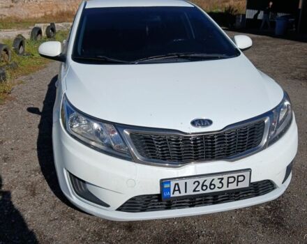 Белый Киа Рио, объемом двигателя 1.4 л и пробегом 277 тыс. км за 6016 $, фото 1 на Automoto.ua