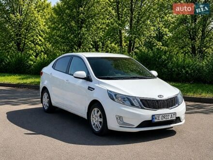 Белый Киа Рио, объемом двигателя 1.4 л и пробегом 225 тыс. км за 5900 $, фото 1 на Automoto.ua
