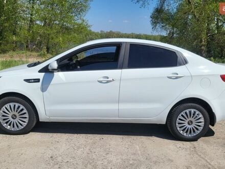 Білий Кіа Ріо, об'ємом двигуна 1.4 л та пробігом 220 тис. км за 7300 $, фото 1 на Automoto.ua