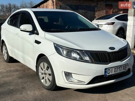 Білий Кіа Ріо, об'ємом двигуна 1.59 л та пробігом 221 тис. км за 5800 $, фото 1 на Automoto.ua