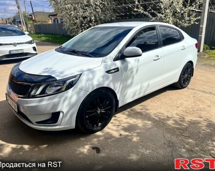 Белый Киа Рио, объемом двигателя 1.4 л и пробегом 260 тыс. км за 6250 $, фото 1 на Automoto.ua