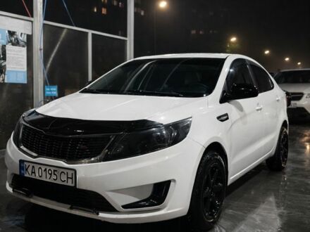 Білий Кіа Ріо, об'ємом двигуна 1.4 л та пробігом 248 тис. км за 7499 $, фото 1 на Automoto.ua