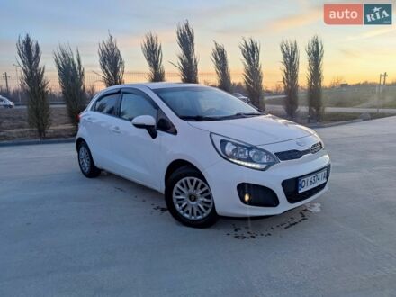 Білий Кіа Ріо, об'ємом двигуна 1.4 л та пробігом 299 тис. км за 6700 $, фото 1 на Automoto.ua