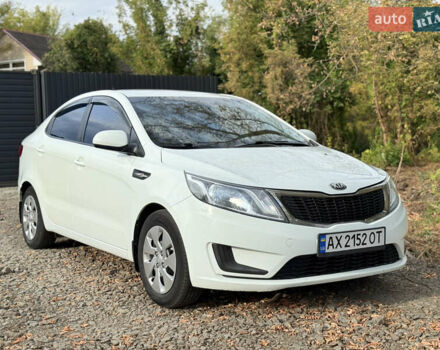 Белый Киа Рио, объемом двигателя 1.4 л и пробегом 301 тыс. км за 5999 $, фото 1 на Automoto.ua