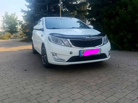 Белый Киа Рио, объемом двигателя 1.4 л и пробегом 180 тыс. км за 7600 $, фото 1 на Automoto.ua