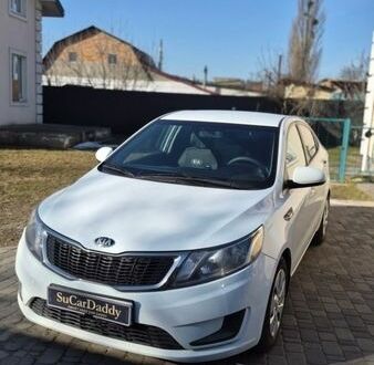 Білий Кіа Ріо, об'ємом двигуна 1.4 л та пробігом 212 тис. км за 7300 $, фото 1 на Automoto.ua