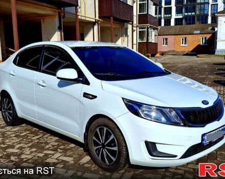 Белый Киа Рио, объемом двигателя 1.4 л и пробегом 87 тыс. км за 8750 $, фото 1 на Automoto.ua