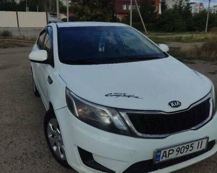 Белый Киа Рио, объемом двигателя 1.4 л и пробегом 215 тыс. км за 5650 $, фото 1 на Automoto.ua