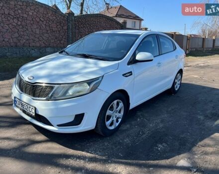 Белый Киа Рио, объемом двигателя 1.4 л и пробегом 210 тыс. км за 5800 $, фото 1 на Automoto.ua