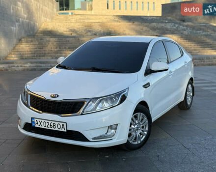 Белый Киа Рио, объемом двигателя 1.4 л и пробегом 185 тыс. км за 6700 $, фото 1 на Automoto.ua