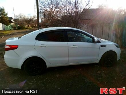 Белый Киа Рио, объемом двигателя 1.4 л и пробегом 870 тыс. км за 7500 $, фото 1 на Automoto.ua
