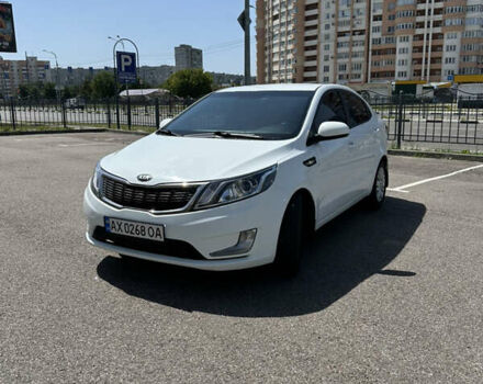 Білий Кіа Ріо, об'ємом двигуна 1.4 л та пробігом 184 тис. км за 7900 $, фото 1 на Automoto.ua