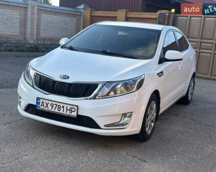 Белый Киа Рио, объемом двигателя 1.4 л и пробегом 145 тыс. км за 6650 $, фото 1 на Automoto.ua